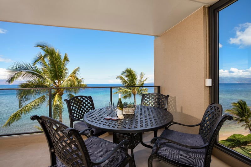 Dine al fresco as the sun melts into the sea—your lanai sanctuary invites you to savor every golden hour moment