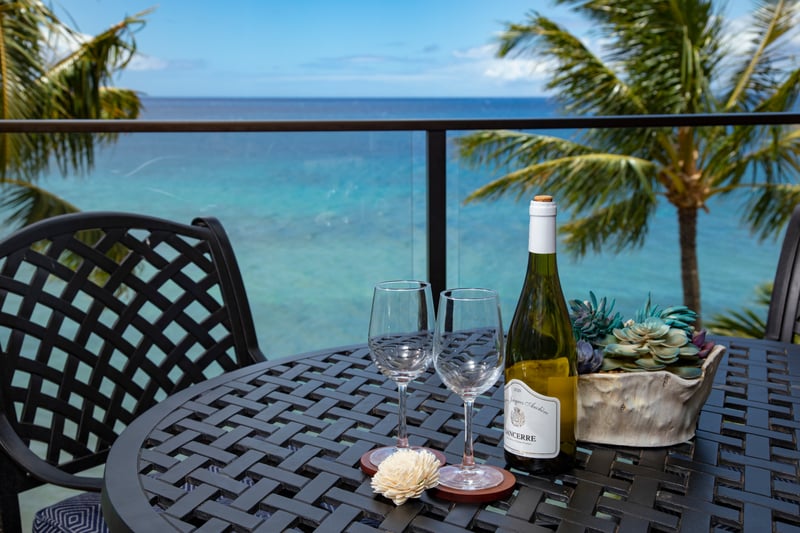 Sip something chilled and feel the trade winds on your skin—this is your breezy, beachfront living room in the sky MAH-611