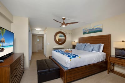 Wrapped in crisp linens and kissed by natural light, this peaceful bedroom is a symphony of sky, sea, and slow mornings done right