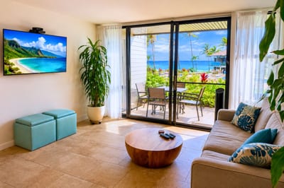 Relax on the plush sofa and enjoy your wall-mounted flat-screen TV, with sliding glass doors thrown open to a lanai framed by palms and a glittering ocean view -- indoor-outdoor Maui living made easy.