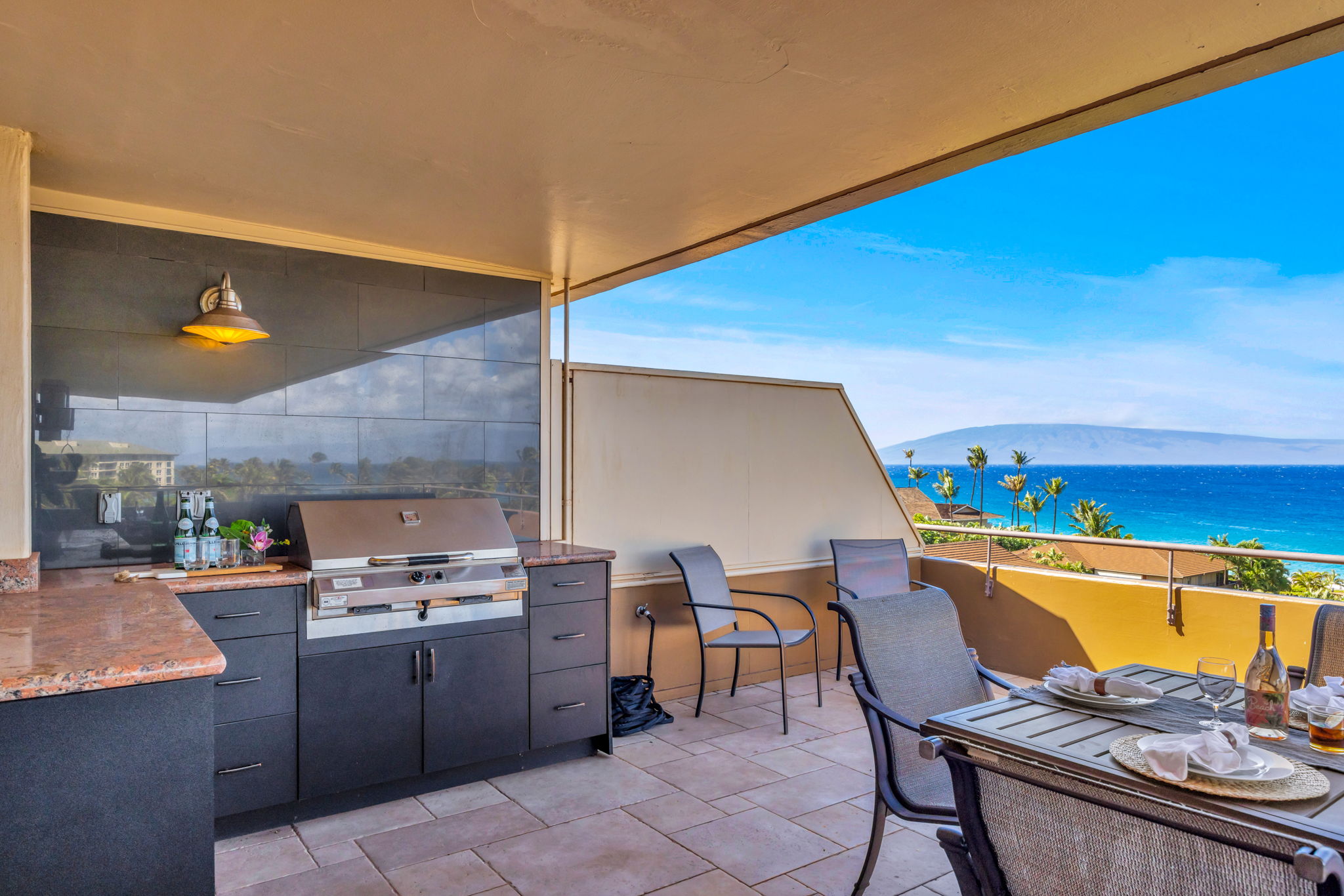 Enjoy your meals on this beautiful balcony, with sights overlooking the beautiful blue water. 