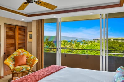 Wake up to ocean peeks and soft breezes in your tranquil master bedroom with King bed.