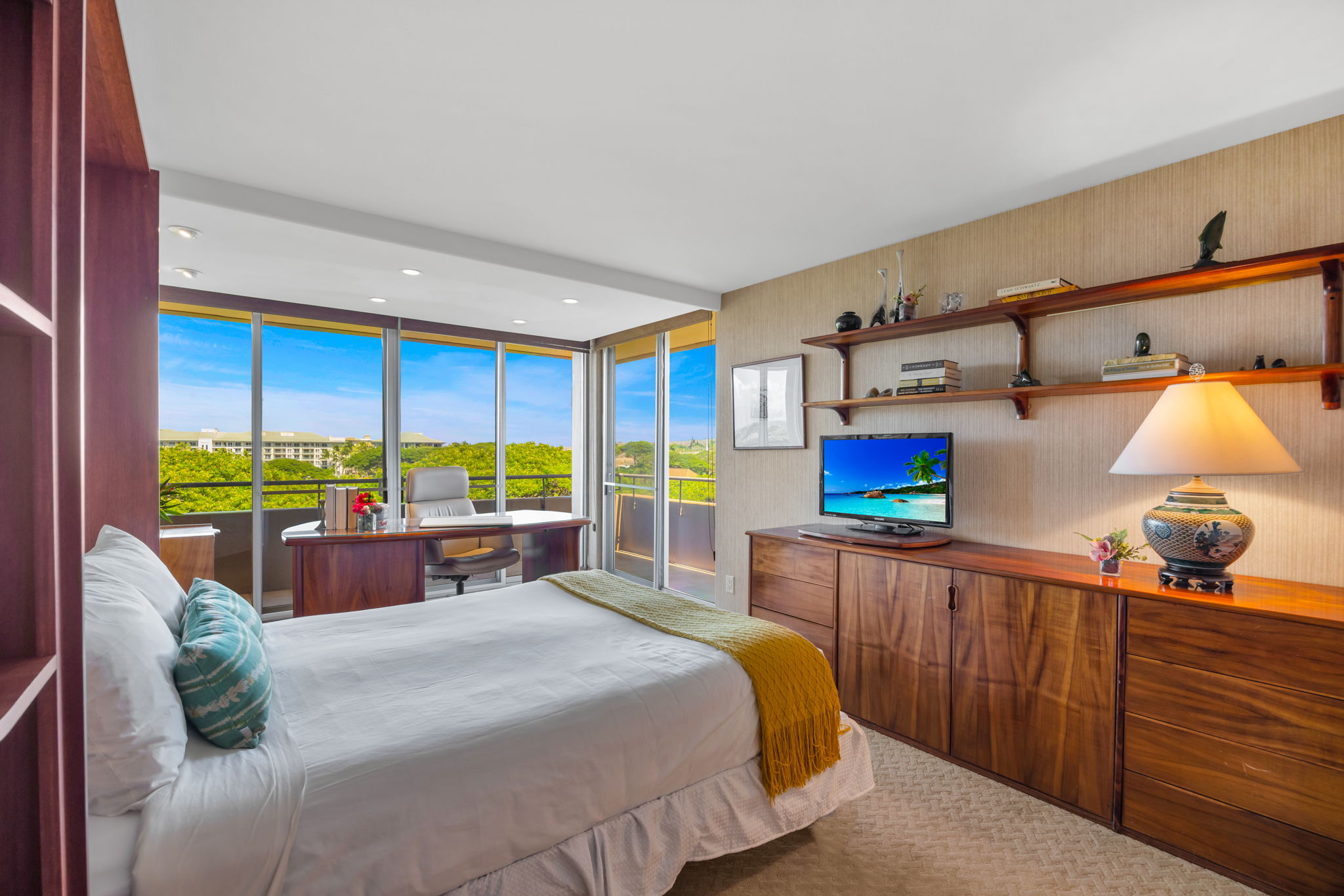 Second bedroom with Queen bed and TV, perfect for friends or additional family members.