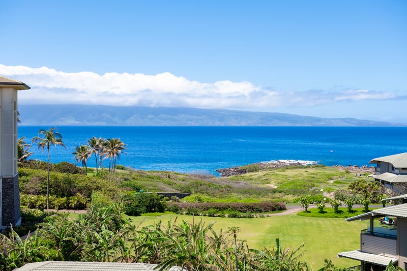  From your private lanai, gaze over rooftops wrapped in palm fronds and beyond to where sapphire seas kiss the sky  