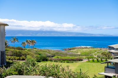 From your private lanai, gaze over rooftops wrapped in palm fronds and beyond to where sapphire seas kiss the sky