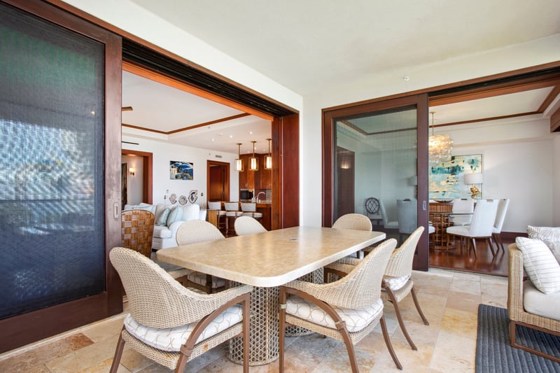   Seamless indoor-outdoor living at its finest—enjoy open-air dining steps from the kitchen and coastal comforts 