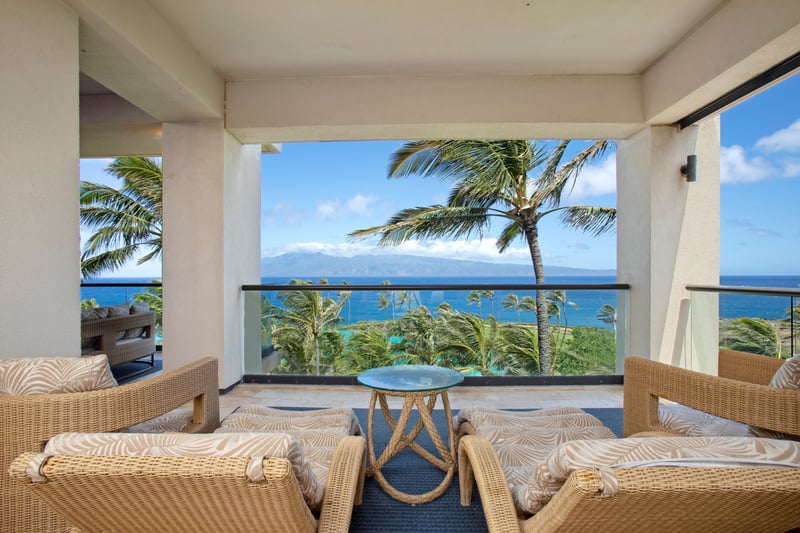 This master suite is a harmonious blend of island elegance and comfort, crowned by panoramic views of paradise   