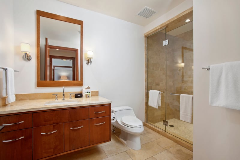 The tub and shower sit like old friends—one for dreamy escapes, the other for refreshing returns to reality   