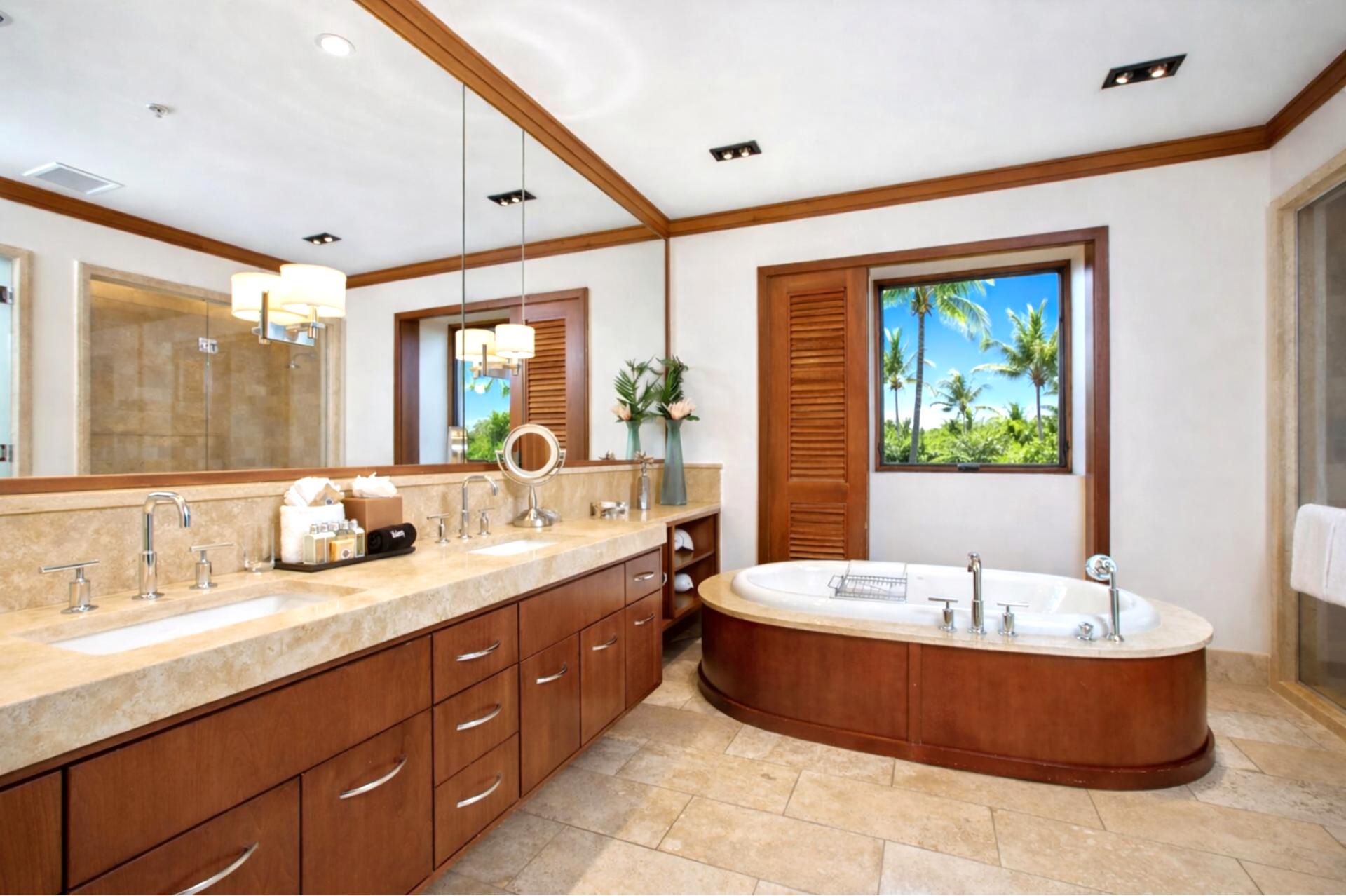 In your Master Bath, a walk in shower and deep soaking tub are complemented by dual vanities and warm wood cabinetry.