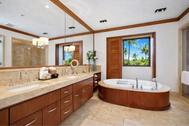 In your Master Bath, a walk in shower and deep soaking tub are complemented by dual vanities and warm wood cabinetry. MON-2204