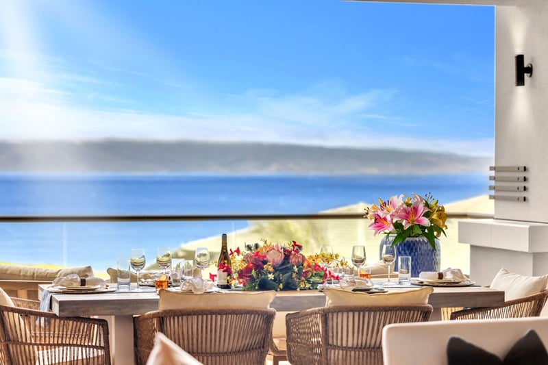 Feel the warmth of the Hawaiian sun as you gaze out onto the ocean.