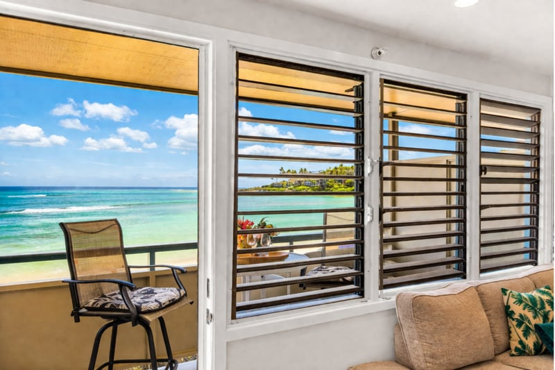 Open the shutters and let the sound of the waves fill the room.