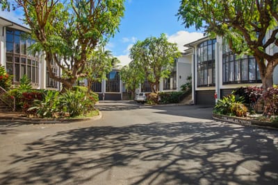 Nestled in Napili Bay’s beauty, this upscale residence greets you with tropical trees and vacation serenity
