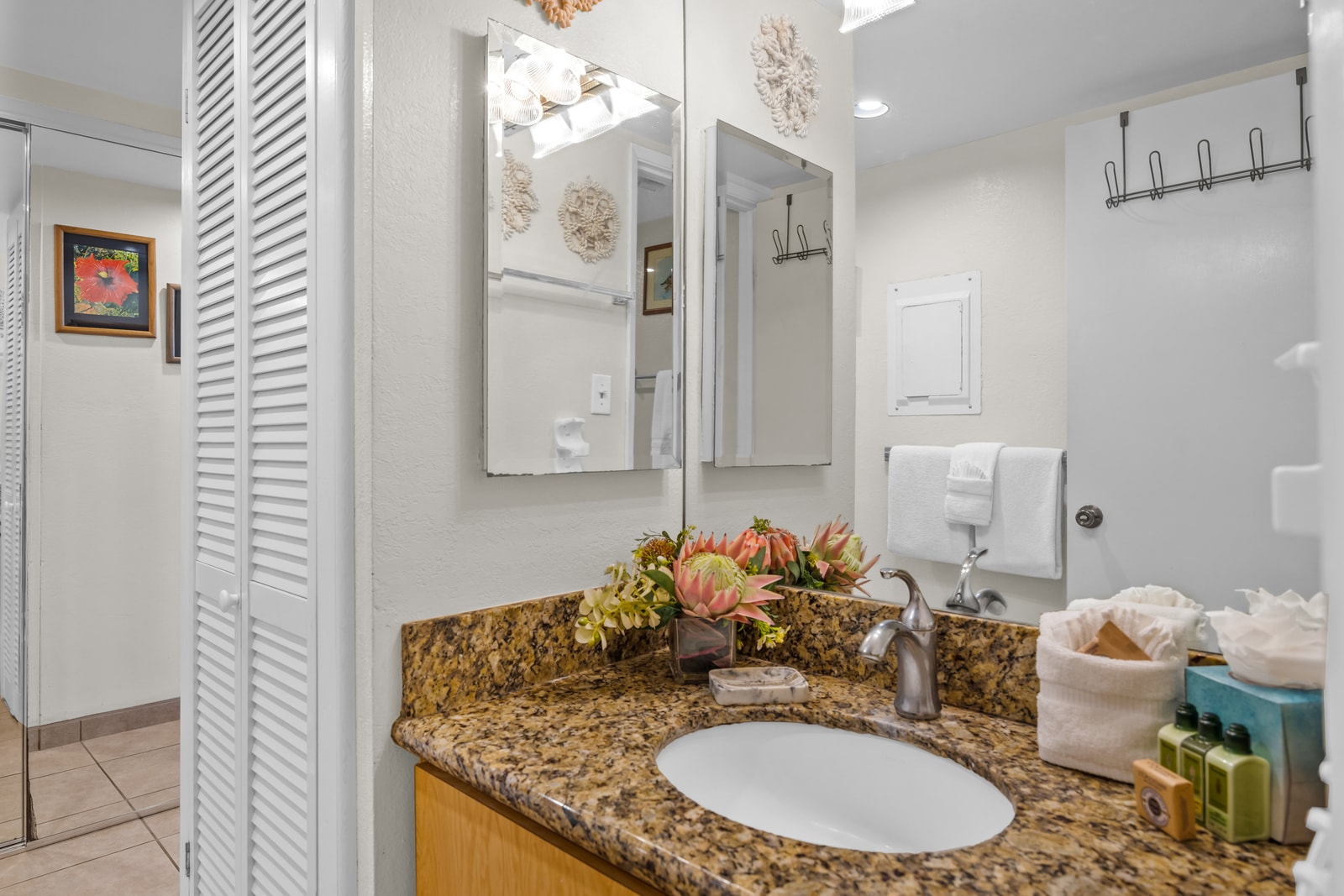 The bright bathroom space gives you ample light for getting ready or winding down NAP-A24