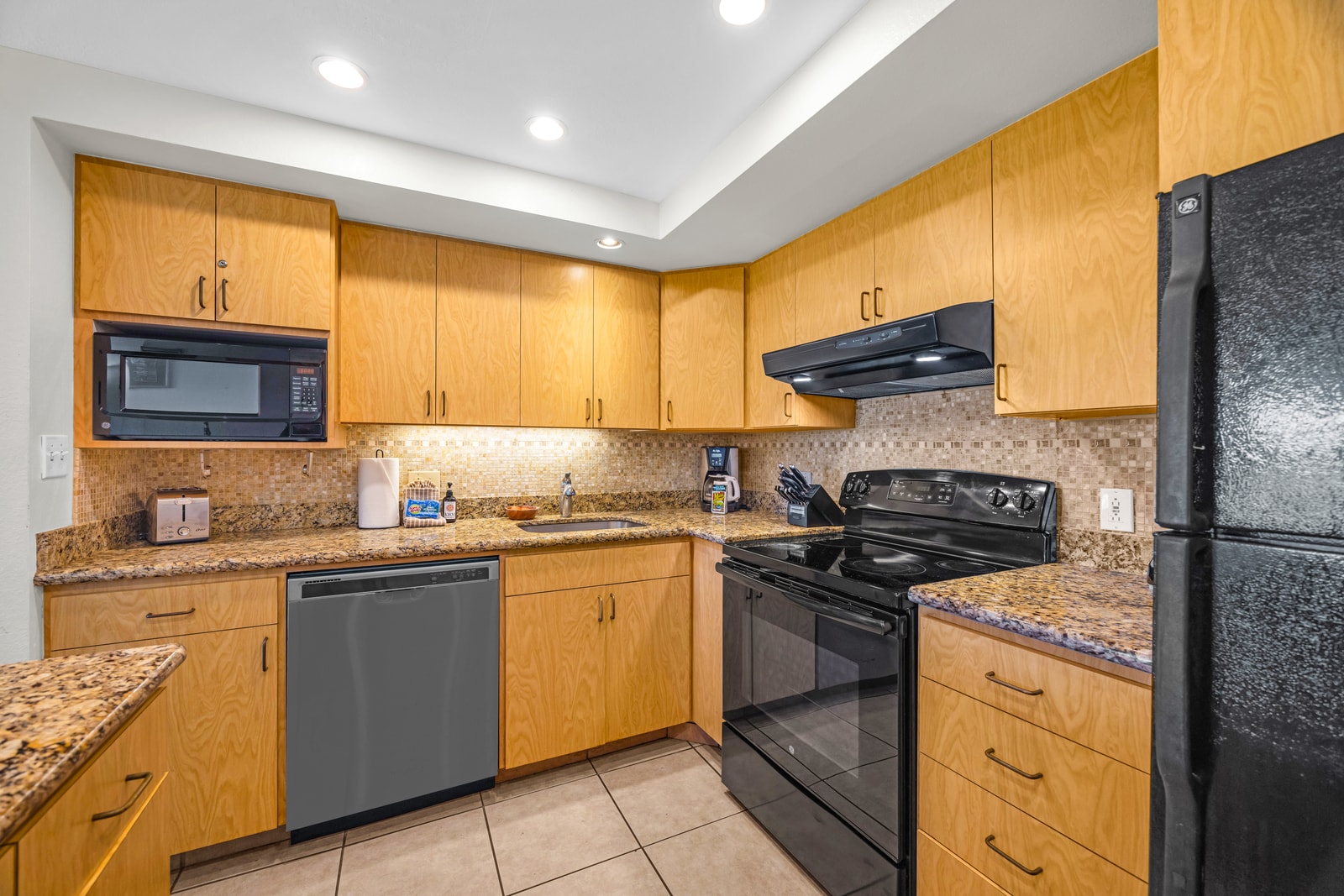 Cook comfortably in a well equipped vacation kitchen NAP-A24