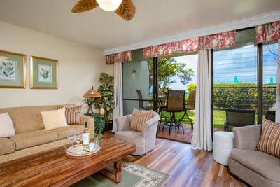 Wake up to ocean whispers and soft tropical light—this breezy haven opens directly onto lush island greenery NAP-A25