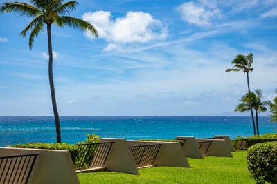 Escape to coastal paradise—where vivid skies meet turquoise waters and luxury greets you with a breeze
