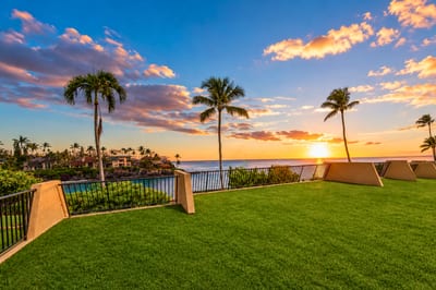 Lush lawns lead to breathtaking panoramic views of gorgeous sunsets over the Pacific.