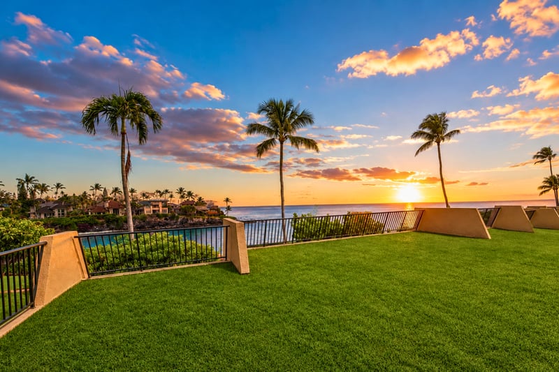 Lush lawns lead to breathtaking panoramic views of gorgeous sunsets over the Pacific.