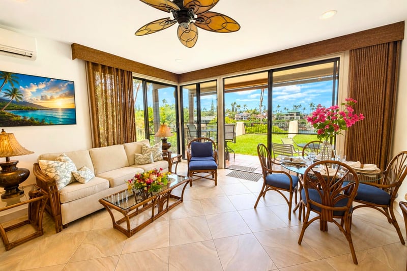Spacious island inspired living area with seamless indoor outdoor comfort