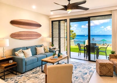 Open living area with ocean views and direct access to the lanai beyond