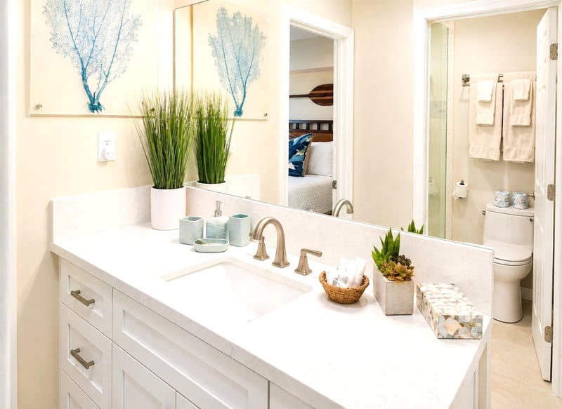The primary bath offers a bright, well-appointed vanity area with clean finishes throughout
