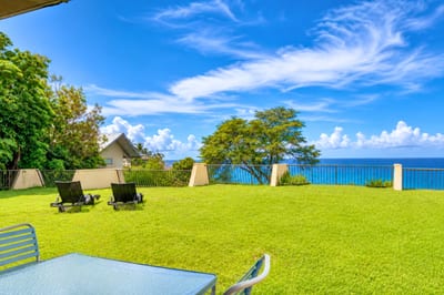 Step outside onto the lush, green lawns of Napili Point—just feet away from the sparkling Pacific Ocean.