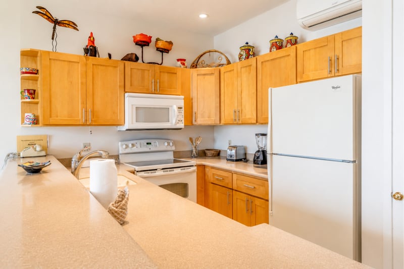 Fully stocked with everything you need, including a coffee maker for your morning brew and a blender for tropical smoothies.
