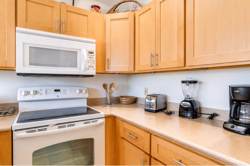 Complete with full-sized appliances, including a stove, oven, microwave, and a large refrigerator to stock all your local island treats.