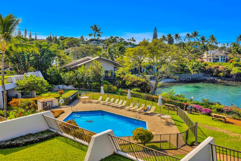 Cool off at the oceanfront pool area with sweeping water views, just steps from the coastline and island breezes.