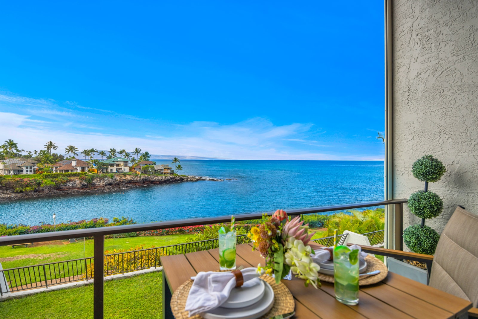 Lounge on your private lanai with sweeping ocean scenery, then head down for a closer look at the shoreline below. NAP-C32