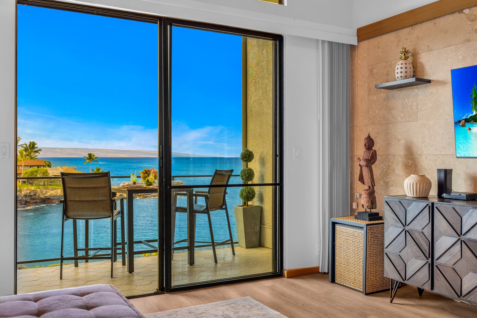 Slide open the doors and step onto your lanai, where island breezes and blue water views turn any meal into a moment. NAP-C32