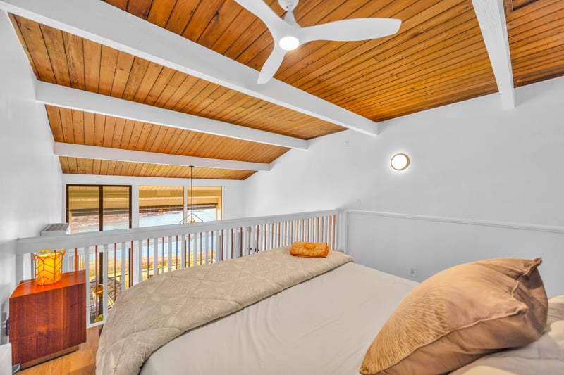 This guest bedroom view highlights the clean lines and cozy bedding, a restful place to recharge between adventures.