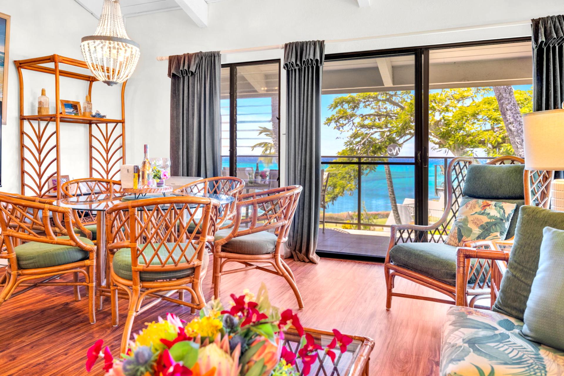 Bright and airy living space with tropical décor and stunning ocean views—perfect for relaxing after a day of island adventures. NAP-C37