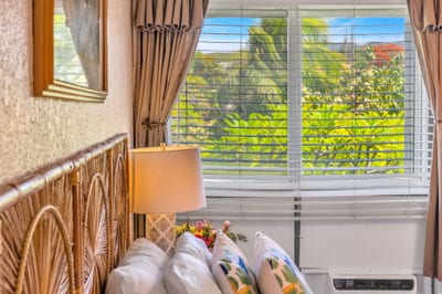 Wake up to lush garden views and gentle island light streaming through the window. NAP-C37