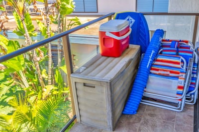 Fully stocked with beach gear—chairs, cooler, and boogie boards—so you can hit the sand in style. NAP-C37