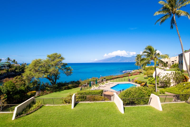 Panoramic paradise awaits—bask in ocean views, lush greens, and poolside serenity from sunrise to sunset     NAP-C42