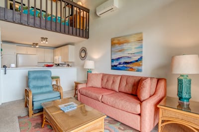 Greet each morning with floor-to-ceiling ocean views, plush seating, and the gentle rhythm of waves beyond. NAP-C42