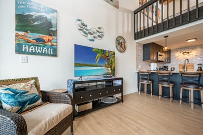 Retro surf vibes meet modern comfort in this cozy corner, with island flair, warm textures, and a beachy breeze