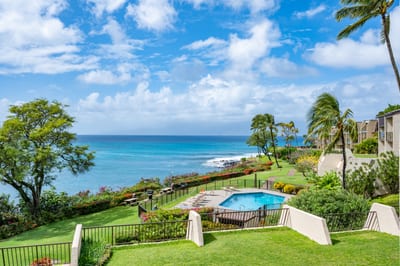 Wake up to sweeping ocean views, lush tropical gardens, and peaceful poolside serenity from your private lanai perch
