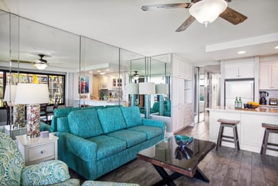 Bright living area with coastal decor, ocean views, and a Smart TV for easy movie nights.