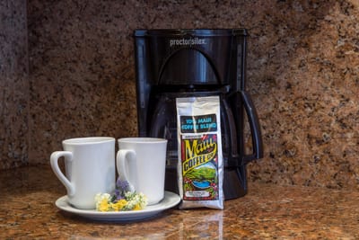 Brew up a little island joy—your coffee corner features bold local blends and everything you need to unwind