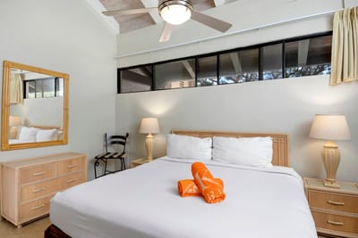 Soothing tones and natural textures frame this inviting bed—perfect for quiet mornings and soft dreams