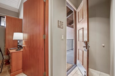 Step through the door and into comfort—where thoughtful touches and warm wood tones welcome you home in style