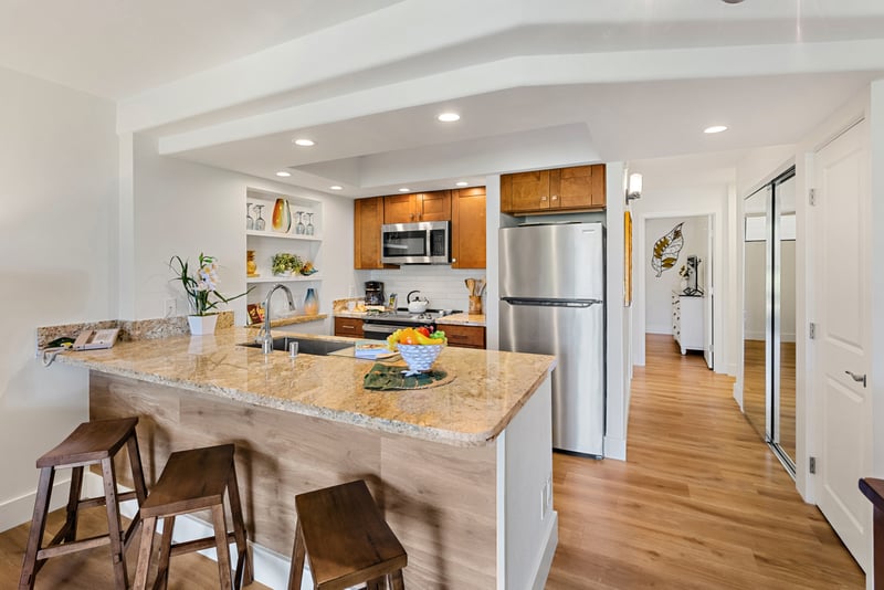 Prepare island inspired dishes in your well equipped kitchen with full size refrigerator, oven, microwave, and dishwasher. PKD-104