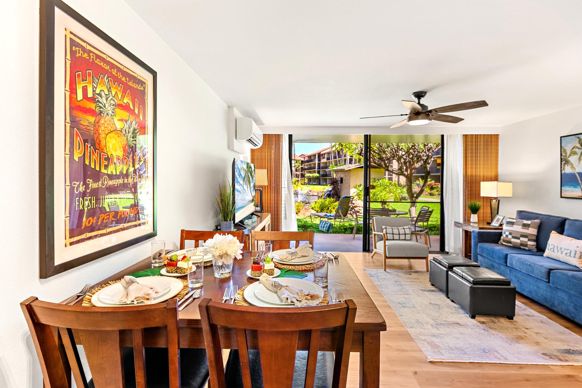 Enjoy meals at your dining table set beneath colorful island artwork, just steps from your lanai and kitchen.