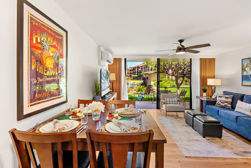 Enjoy meals at your dining table set beneath colorful island artwork, just steps from your lanai and kitchen. PKD-104