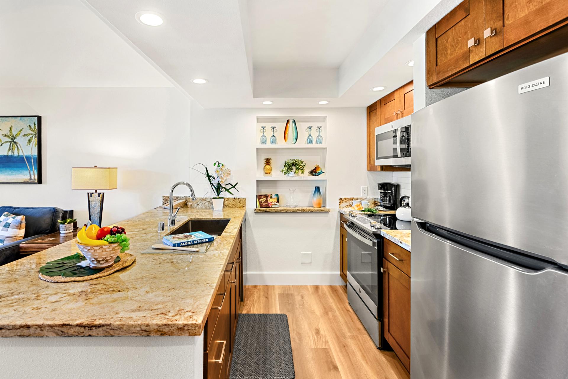 Cook with ease using ample cabinetry and modern appliances, keeping everything you need within reach.