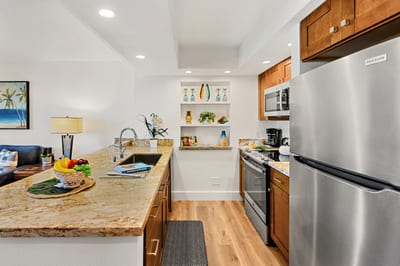 Cook with ease using ample cabinetry and modern appliances, keeping everything you need within reach. PKD-104