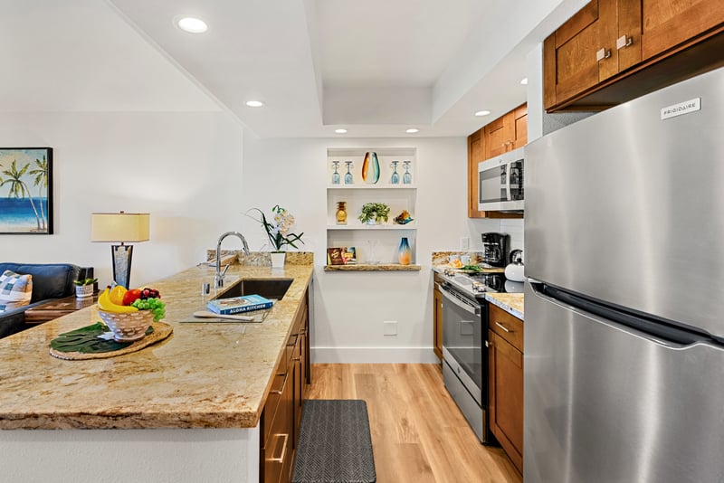 Cook with ease using ample cabinetry and modern appliances, keeping everything you need within reach. PKD-104